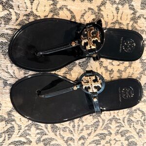 Tory Burch Black and Gold Flip Flops